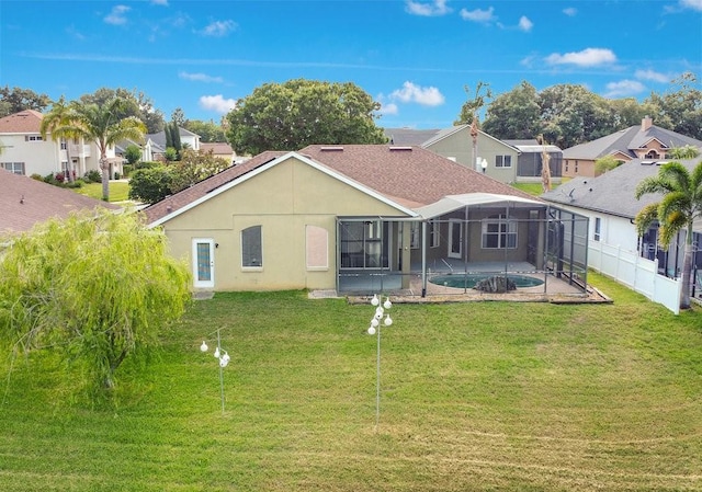 529 Quail Down Dr, Debary, FL 32713 - back of house with a residential view, glass enclosure, a patio area, and stucco siding