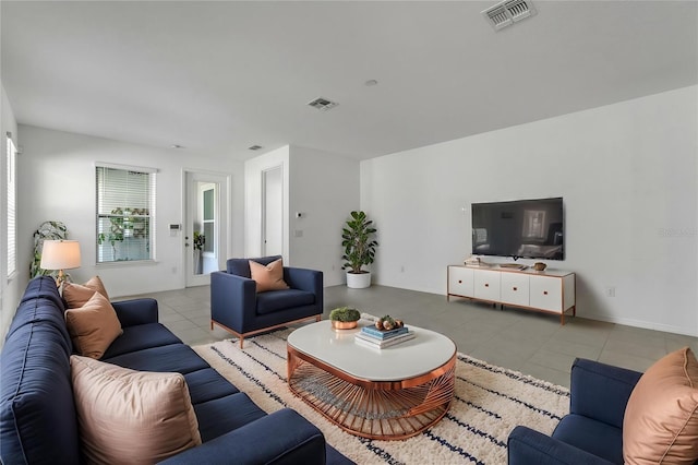8518 Nemours Pkwy, Orlando, FL 32827 - living area featuring tile patterned floors
