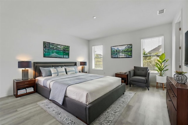 8518 Nemours Pkwy, Orlando, FL 32827 - bedroom with light wood finished floors
