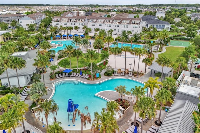 8518 Nemours Pkwy, Orlando, FL 32827 - community pool featuring a residential view
