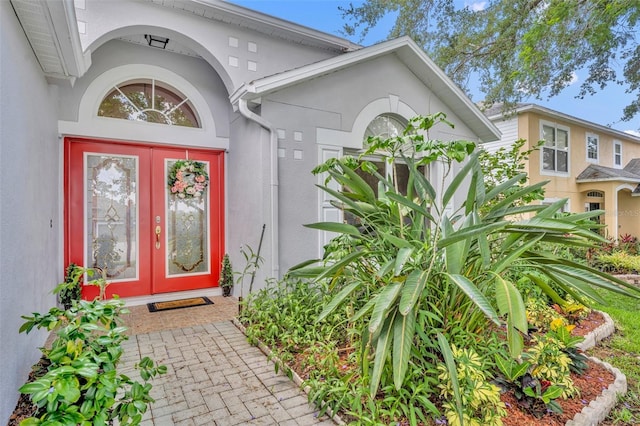 1181 Welch Hill Cir, Apopka, FL 32712 - property entrance with french doors and stucco siding