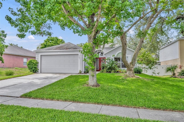 1181 Welch Hill Cir, Apopka, FL 32712 - view of front facade with concrete driveway, an attached garage, and stucco siding