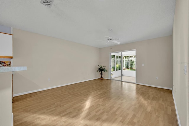 1181 Welch Hill Cir, Apopka, FL 32712 - empty room featuring ceiling fan, light wood-style flooring, and baseboards