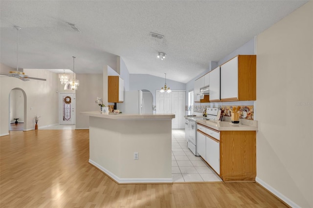 1181 Welch Hill Cir, Apopka, FL 32712 - kitchen featuring white appliances, arched walkways, a chandelier, under cabinet range hood, and ceiling fan
