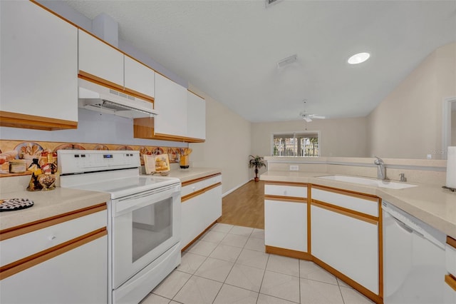 1181 Welch Hill Cir, Apopka, FL 32712 - kitchen featuring white appliances, a sink, light countertops, white cabinets, and under cabinet range hood