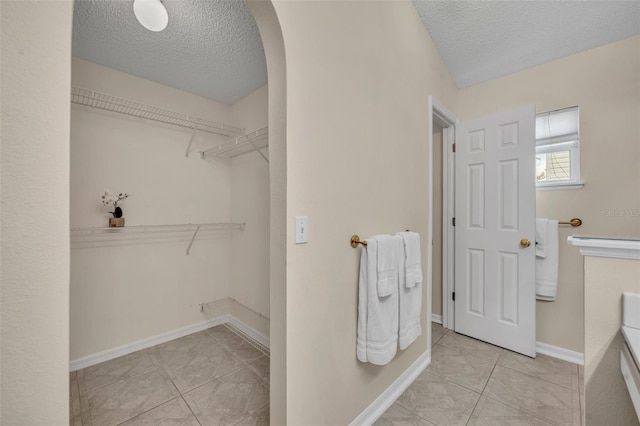 1181 Welch Hill Cir, Apopka, FL 32712 - spacious closet with tile patterned flooring and arched walkways
