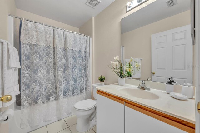 1181 Welch Hill Cir, Apopka, FL 32712 - bathroom with tile patterned floors, vanity, toilet, and shower / bath combo