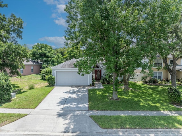 1181 Welch Hill Cir, Apopka, FL 32712 - obstructed view of property featuring a front yard, driveway, and a garage