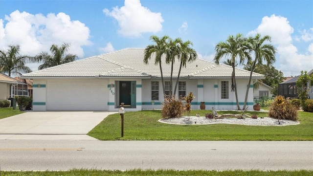 260 Coronado Dr, Punta Gorda, FL 33950 - ranch-style house with a garage, stucco siding, driveway, a front yard, and a tile roof