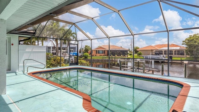 260 Coronado Dr, Punta Gorda, FL 33950 - swimming pool with a water view, a lanai, a patio area, and a residential view