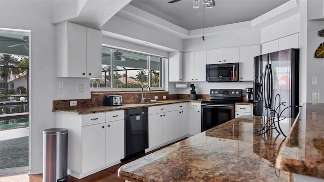 260 Coronado Dr, Punta Gorda, FL 33950 - kitchen featuring ceiling fan, appliances with stainless steel finishes, a sink, and white cabinetry