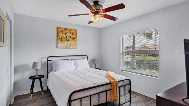 260 Coronado Dr, Punta Gorda, FL 33950 - bedroom featuring wood finished floors, baseboards, and a ceiling fan