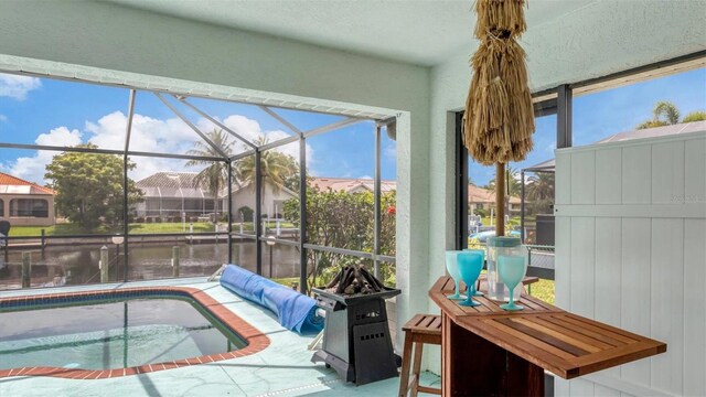 260 Coronado Dr, Punta Gorda, FL 33950 - sunroom featuring a water view