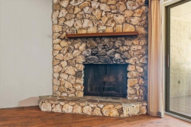3942 Orange Lake Dr, Orlando, FL 32817 - detailed view of wood finished floors and a fireplace