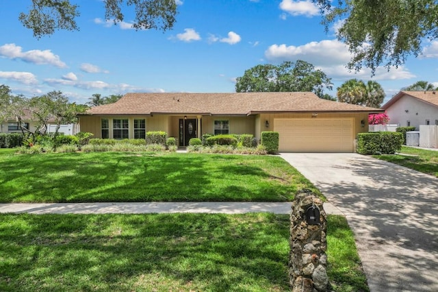 3942 Orange Lake Dr, Orlando, FL 32817 - ranch-style home featuring a garage, concrete driveway, and a front yard