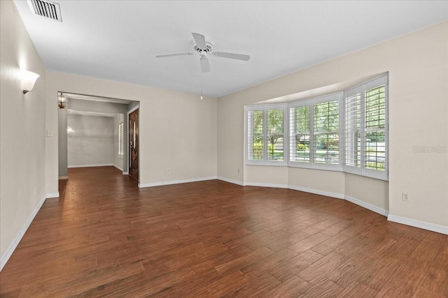 3942 Orange Lake Dr, Orlando, FL 32817 - spare room featuring ceiling fan, baseboards, and wood finished floors