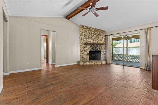 3942 Orange Lake Dr, Orlando, FL 32817 - unfurnished living room with wood finished floors, ceiling fan, a stone fireplace, a textured ceiling, and crown molding