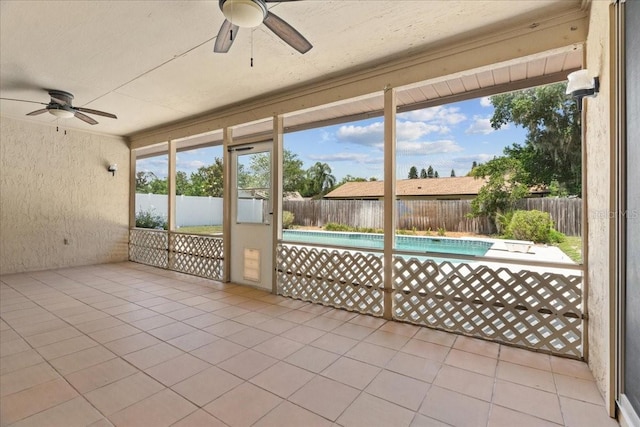 3942 Orange Lake Dr, Orlando, FL 32817 - unfurnished sunroom featuring a ceiling fan and healthy amount of natural light