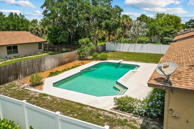 3942 Orange Lake Dr, Orlando, FL 32817 - view of swimming pool with a patio and a diving board