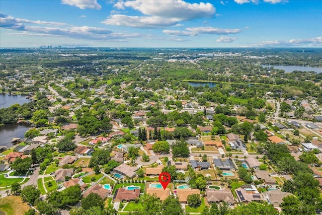 3942 Orange Lake Dr, Orlando, FL 32817 - aerial view of property's location with a nearby body of water and nearby suburban area