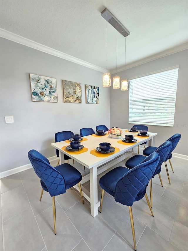 949 Leader St, Davenport, FL 33896 - dining area with ornamental molding, baseboards, and light tile patterned floors