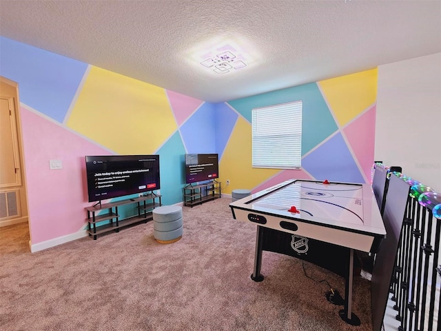 949 Leader St, Davenport, FL 33896 - game room featuring carpet floors, a textured ceiling, and baseboards