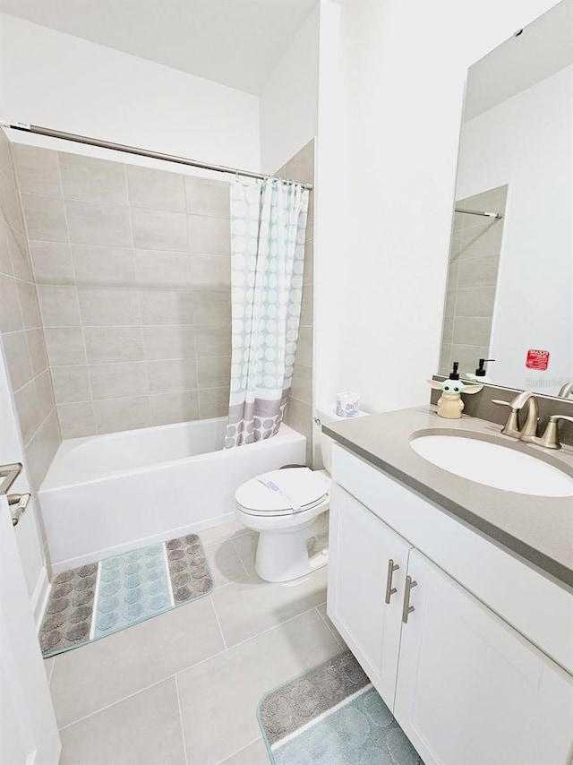 949 Leader St, Davenport, FL 33896 - full bath with shower / bathtub combination with curtain, vanity, toilet, and tile patterned flooring