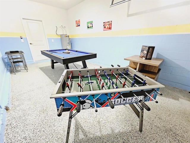 949 Leader St, Davenport, FL 33896 - playroom with concrete block wall, speckled floor, and billiards table