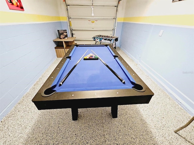 949 Leader St, Davenport, FL 33896 - game room featuring a garage and concrete block wall