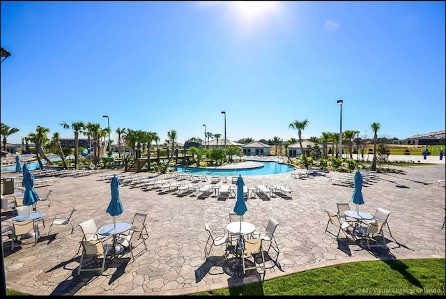 949 Leader St, Davenport, FL 33896 - community pool featuring a patio