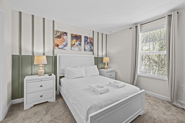 8822 Interlocking Ct, Davenport, FL 33896 - bedroom featuring light colored carpet and baseboards