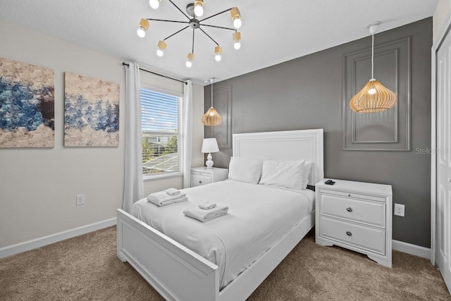 8822 Interlocking Ct, Davenport, FL 33896 - bedroom with carpet floors, a chandelier, and baseboards