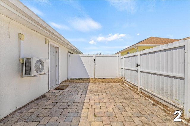 10227 Parsons St, Tampa, FL 33615 - fenced backyard featuring ac unit, a patio area, and a gate