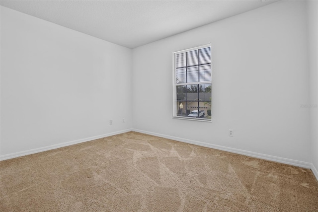 12824 Cloverdale Ln, Clermont, FL 34711 - carpeted spare room featuring baseboards