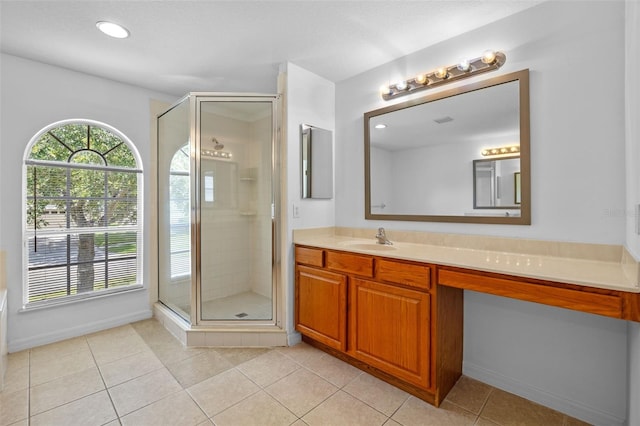 12824 Cloverdale Ln, Clermont, FL 34711 - bathroom with vanity, a shower stall, tile patterned floors, and recessed lighting