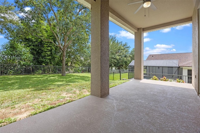 12824 Cloverdale Ln, Clermont, FL 34711 - fenced backyard featuring a patio area and a ceiling fan