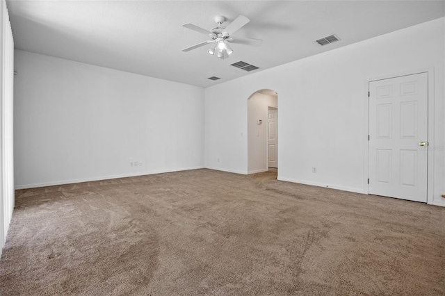 12824 Cloverdale Ln, Clermont, FL 34711 - carpeted spare room featuring ceiling fan and arched walkways