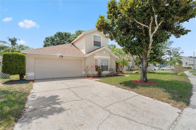 9145 Fort Jefferson Blvd, Orlando, FL 32822 - traditional-style house with stucco siding, a front lawn, an attached garage, concrete driveway, and a shingled roof