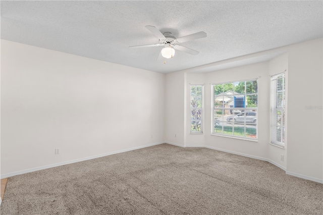 9145 Fort Jefferson Blvd, Orlando, FL 32822 - carpeted empty room featuring ceiling fan, a textured ceiling, and baseboards