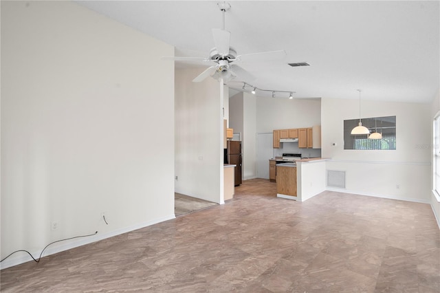 9145 Fort Jefferson Blvd, Orlando, FL 32822 - unfurnished living room with a ceiling fan, baseboards, and high vaulted ceiling