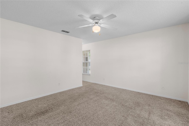 9145 Fort Jefferson Blvd, Orlando, FL 32822 - empty room with ceiling fan, carpet, a textured ceiling, and baseboards