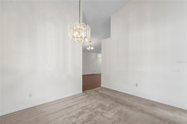 9145 Fort Jefferson Blvd, Orlando, FL 32822 - carpeted empty room featuring a chandelier and baseboards