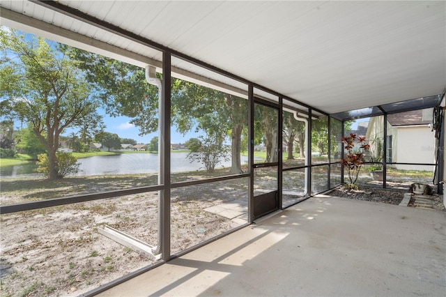 9145 Fort Jefferson Blvd, Orlando, FL 32822 - unfurnished sunroom with a water view