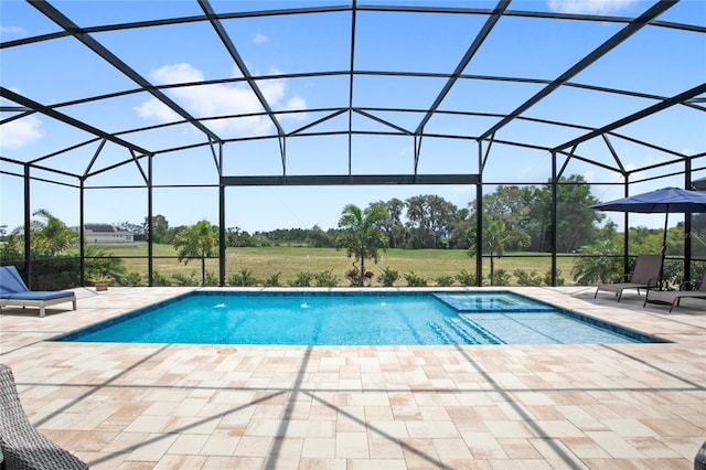 15049 Canopy Cover Dr, Winter Garden, FL 34787 - outdoor pool featuring a patio area, glass enclosure, and a yard