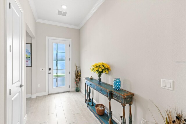 15049 Canopy Cover Dr, Winter Garden, FL 34787 - doorway with ornamental molding and baseboards