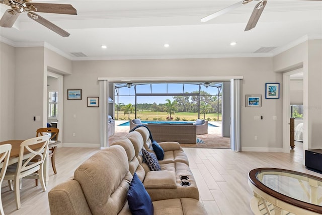 15049 Canopy Cover Dr, Winter Garden, FL 34787 - living area with ceiling fan, a sunroom, light wood-type flooring, recessed lighting, and baseboards