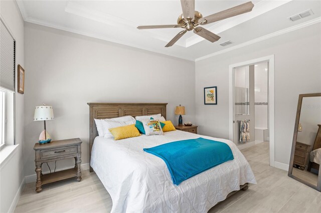 15049 Canopy Cover Dr, Winter Garden, FL 34787 - bedroom with light wood-type flooring, crown molding, a ceiling fan, baseboards, and connected bathroom