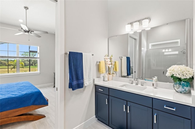 15049 Canopy Cover Dr, Winter Garden, FL 34787 - bathroom featuring vanity, a shower stall, baseboards, and ceiling fan