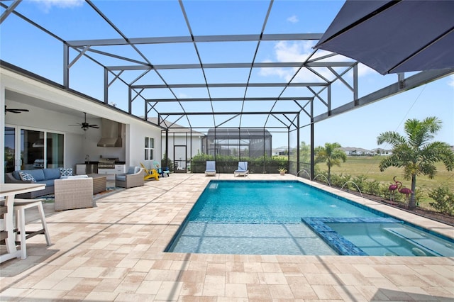 15049 Canopy Cover Dr, Winter Garden, FL 34787 - view of swimming pool with an outdoor hangout area, a patio area, a ceiling fan, a pool with connected hot tub, and a lanai