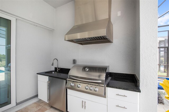 15049 Canopy Cover Dr, Winter Garden, FL 34787 - view of patio / terrace with a sink, a grill, and glass enclosure